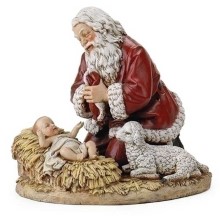 Kneeling Santa with Jesus in Manger