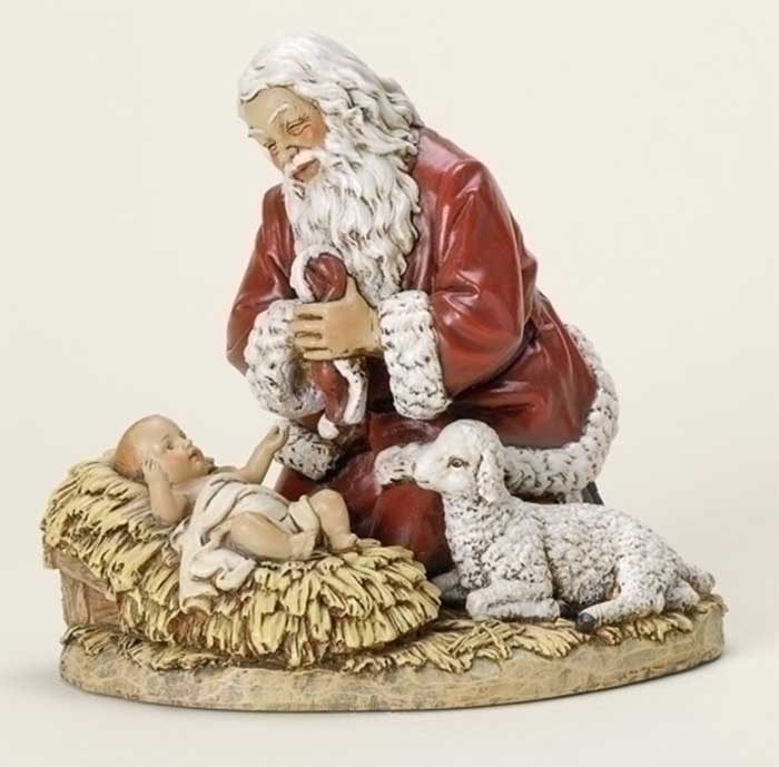 Kneeling Santa with Jesus in Manger